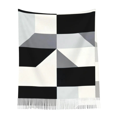 Black And White Piano Grid Winter Scarf Crafted From Plush Faux Cashmere With Extended Fringe Edges, stylish geometric design.