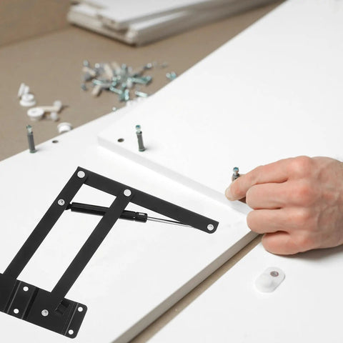 Installation of Heavy Duty Spring Cupboard Door Hinges Set Pneumatic Folding Lid Support on white wooden cabinet lid