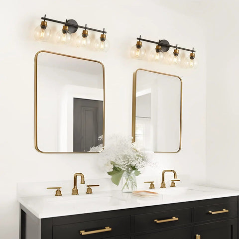 Black And Gold 4 Light Vanity Lights With Clear Globe Shade For Farmhouse Modern Bathroom Over Mirror, installed above dual sinks