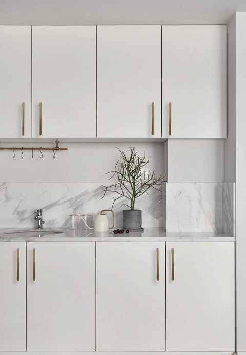 Modern kitchen with white cabinets featuring 10 Pack 8 Inch Hole Center Champagne Cabinet Pulls In Stainless Steel Square Drawer Handles.