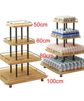 Straight Up Sturdy Four Tier Square Storage Rack Multi Purpose Steel Shelving Unit For Kitchen Warehouse Grocery Display stacked with products.