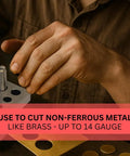 Person using 7 Piece Circular Disc Cutter Set With Wooden Storage Box Square Design Includes Round Punches One Quarter Inch Through Five Eighth Inch Heavy Duty Hardened Steel Cuts Up To Eighteen Gauge Rock Solid For Metalworking to cut non-ferrous metal.