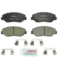 Bosch BC943 QuietCast ceramic front brake pad set for Honda Pilot; includes four pads, hardware, and lubricant.