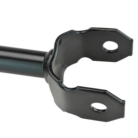 Rear suspension bracket, black metal with two mounting holes, close-up view