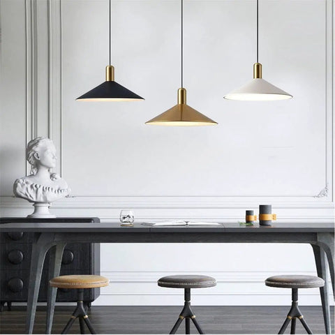 Dope Farmhouse Matte Black Barn Pendant Light With Brass Accents hanging above a dining room table