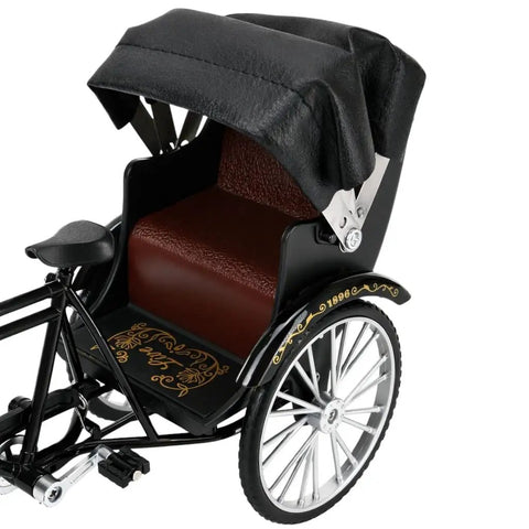 Vintage Metal Tricycle Model With Heavy Duty Aluminum Alloy Build And Old School Three Wheel Rickshaw Design showing detailed black seat and canopy.