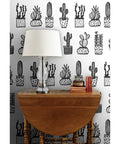 Heavy Hitter Commercial Wallpaper Featuring Bold Botanical Prints And Soft Linen Texture, Pvc Free Paste To Paper Wallcovering Built Different For High Traffic Spaces, featuring black plant designs on a white backdrop.