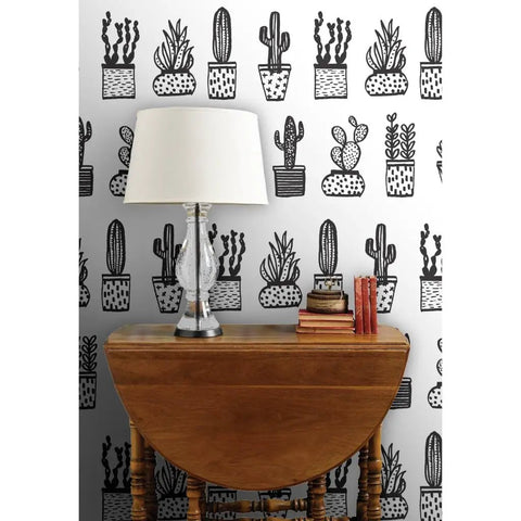 Heavy Hitter Commercial Wallpaper Featuring Bold Botanical Prints And Soft Linen Texture, Pvc Free Paste To Paper Wallcovering Built Different For High Traffic Spaces, featuring black plant designs on a white backdrop.