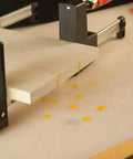 Silicone Glue Mat XXL For Workbench 23.5 By 60 Inches Easy Clean Craft Surface with glue spills and wood board on workbench.