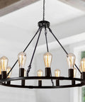 31.5 Inch Wagon Wheel Chandelier With 12 Lights Black Industrial Rustic Farmhouse Ceiling Fixture For Dining Room Foyer Living Room Or Kitchen Island With Soft Warm Glow And 360 Degree Lighting That Feels Modern Yet Vintage Vibe in a home setting