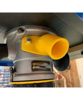 Close-up of Universal Dust Port Adapter for Router Tables attached to DW6184 base, efficiently directing sawdust away.