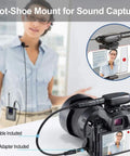 Wireless Lavalier Mic System with dual UHF lapel mics for iPhone and DSLR showing mounted setup for pro grade audio.