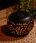 Solar Table Lantern With Dancing Flickering Flame LED Light Outdoor Waterproof Black Metal Desk Lamp on woven surface