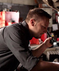 Mechanic uses Stinger Classic Tough as Nails 500 Lumen Rechargeable Flashlight with 120 Volt AC and 12 Volt DC Piggyback Charger