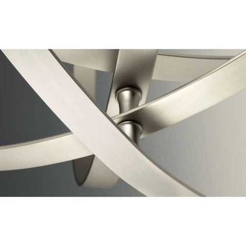 Close-up of the Astronomy Inspired Equinox Three-Light Sphere Pendant in Burnished Silver showing concentric ring design.