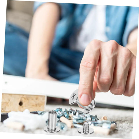 Built Tough Chicago Style Binding Screws For Books And Scrapbooks And Paper Crafts Using 75 Piece Silver Carbon Steel Fasteners with fingers selecting screws.