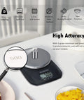 Awesome Compact Digital Food Scale For Cooking And Baking Small Kitchen Scale In Grams And Ounces Stainless Steel Tare Function Backlit LCD Display Space Saving Black shown with a magnifying glass focusing on the scale's precision detail