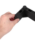 Hand holding Sturdy L Shaped Plastic Furniture Legs With M5 Screws 4 Pack Easy Install Sofa Feet Risers For Cabinets And Dressers
