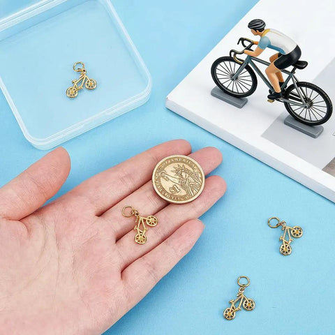 18K Gold Plated Bicycle Charms Set With 4 Pieces Stainless Steel Double Sided Bike Pendants for DIY Jewelry on blue background