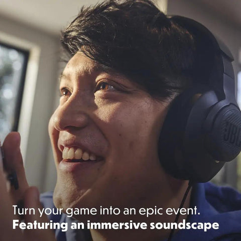 Person wearing Wired Over Ear Gaming Headset With Detachable Microphone Mute Option And Fabric Covered Memory Foam Ear Cushions