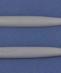 Top view of 1:350 Scale Song Class Submarine Model Kit For Hobbyists 14 Plus with two hull pieces on a blue background