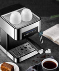 Professional Grade Semi Automatic Espresso Maker Featuring A Built In Conical Burr Grinder And High Pressure Steam Wand, with cups on top.