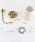 Components of Rustic Wall Sconce With Flared Linen Shade Vertical Mount Bedside Light for Bedroom and Reading Room Antique Style Lamp, shown disassembled.