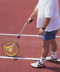 Heavy Duty Measuring Wheel With Molded Rubber Tire And Five Digit Counter Tracks Ten Thousand Feet Adjustable Telescoping Handle in use on a track.