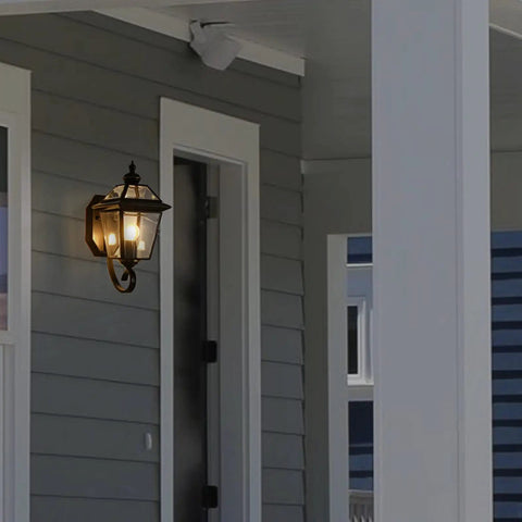 Copper Outdoor Wall Light Fixture 13.7 Inch Exterior Porch Light in Oil Rubbed Bronze finish on a gray house wall with beveled glass.