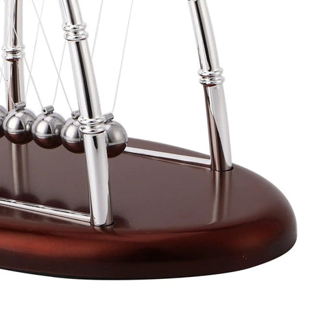 Newton Cradle Desk Toy With Classic Pendulums And Gentle Clinking A Cool Educational Physics Demonstration for home office decor