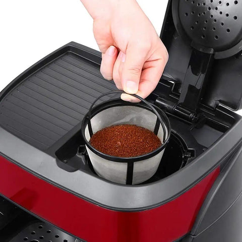 Hand lifting filter basket from Bean To Cup Automatic Coffee Machine With 15 Bar Pump, drip style for home use.