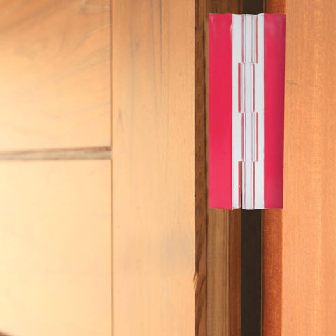 Close-up of Two Pack Acrylic Self-Adhesive Flush Cabinet Hinges 100x42mm on wooden door, clear transparent installation.