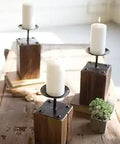 Set Of Three Recycled Wood Candle Holders In Brown Finish, Transitional Style, 5 In By 5 In Base, 13 In Tall on wooden table