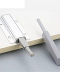 Magnetic Push Latch Kit for Cabinets and Drawers, Quiet Door Stop Closer, silver and grey hardware on white surface
