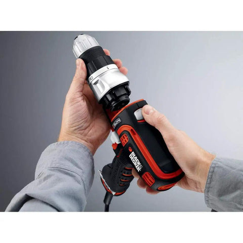 Hands demonstrating Matrix Quick Connect System Drill Driver with Tool Free Attachments, showcasing lightweight compact design.