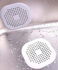 Two Pack Hair Catcher Drain Stopper For Shower And Tub With Strong Suction Cups Water Trap Sink Cover For Bathroom And Kitchen Flexible Thermoplastic Rubber Keeps Drains Clog Free Easy To Install Fits Most Drains in a stainless steel sink