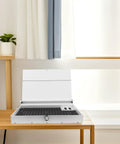 Robust White PVC And Acrylic Model Tool Storage Rack Featuring Multi Compartment Design For Diy Hobbyists on a wooden desk.