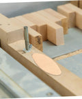 Top Shelf Woodworking Biscuit Joint Kit Brings You One Hundred Heavy Duty Biscuit Plates For Rock Solid Plywood Furniture Build Outs That Truly Deliver Straight Up Quality Results, featuring a biscuit plate in use.