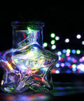 Outdoor Battery Powered Fairy Lights With Timer, 33 Ft Of 100 LED Cozy Warm White Glow Waterproof String Lights in star-shaped jar