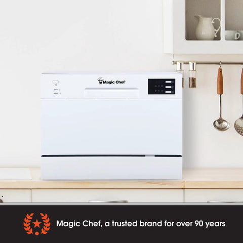 Real Deal Compact Countertop Dishwasher For Modern Kitchens Clean Cycle For Six Place Settings With A Durable Stainless Steel Tub and Super Chill Quiet Operation No Sweat Push Button Controls Space Savvy Portable Mini Washing Machine In Fresh White on kitchen countertop.