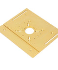 Heavy Duty Router Table With Crank Handle Lifting Kit And Game Changer Precision Woodworking Insert Plate showing golden aluminum insert plate with central opening.