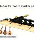 Pro Level Guitar Nut Scribe Tool And Dead On Saddle Height Marker For Acoustic Classical Repairs Durable Aluminum And Brass Build Black Grip on fretboard with string markers.