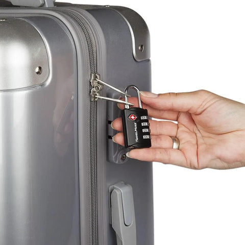 Five Pack TSA Luggage Locks With Four Digit Combination locked on a grey suitcase