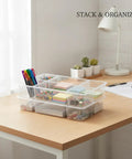 Stackable Desktop Storage Box With Grid Dividers For Pens And Office Supplies, Durable PP Plastic Desk Organizer on a desk