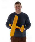 Champ Anniversary Edition 515mm RC Trainer Airplane BNF Basic With Safe Select held by a smiling person