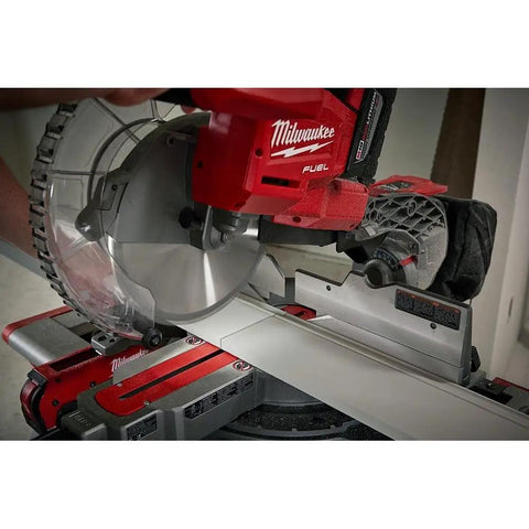 Close-up of Beast Mode 18 Volt Fuel Lithium Ion Brushless Cordless 10 Inch Dual Bevel Sliding Miter Saw cutting wood.