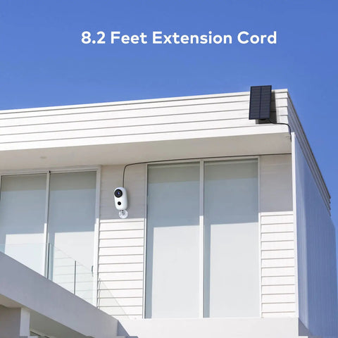 Solar Powered Wireless Outdoor Security Camera With 365 Day Power PIR Motion Detection Alarm Alerts SD Card Slot Two Way Audio 2.4G WiFi 5000mAh Battery mounted on modern house exterior