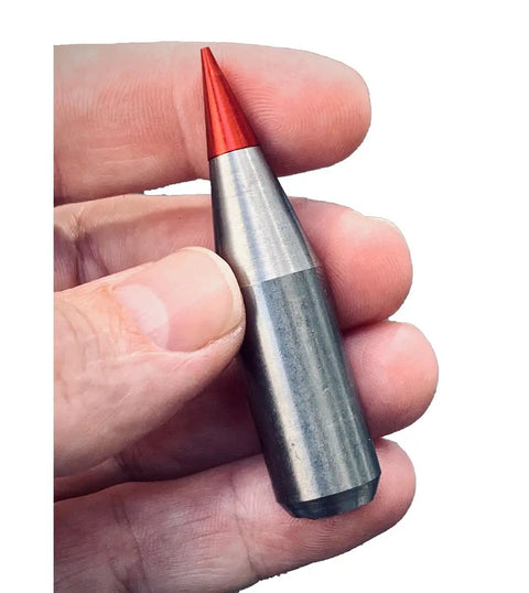 20mm Phalanx CIWS Dummy Round Kit With Red Sabot, Tungsten Penetrator, held in hand, showcasing detail.