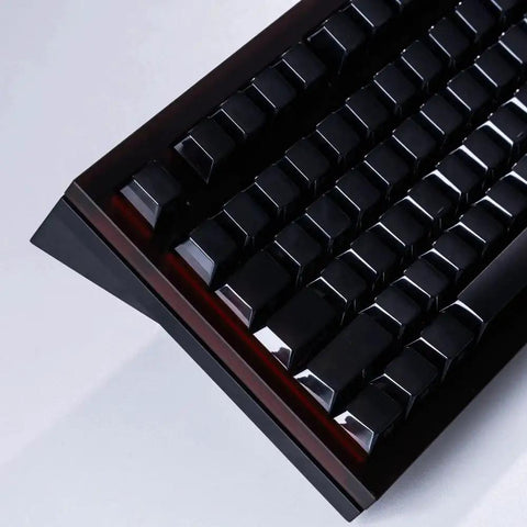 98 Key Silent Mechanical Keyboard With Hot Swappable RGB Lighting And Tri Mode Wireless Setup Giving You A Smooth As Butter Typing Experience Straight Up Built For Gaming Or Daily Grind Use In Night Ink, top view of black keys.