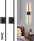 Total Vibe Shift Battery Operated Wall Sconce Set Of Two With Remote Touch Control Dimmable Led Wireless Black Light mounted beside bed.